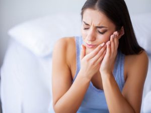 woman with mouth pain